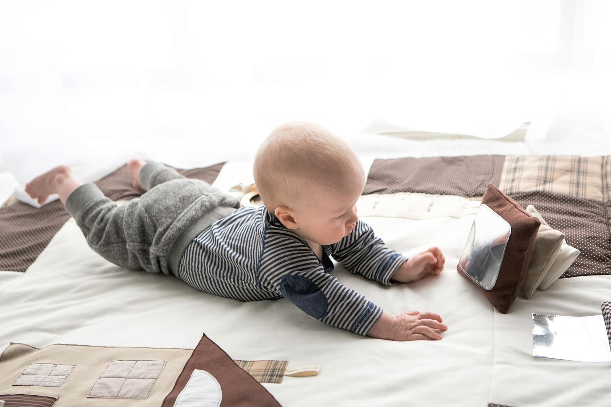 Textile baby toy "Pillow heap"